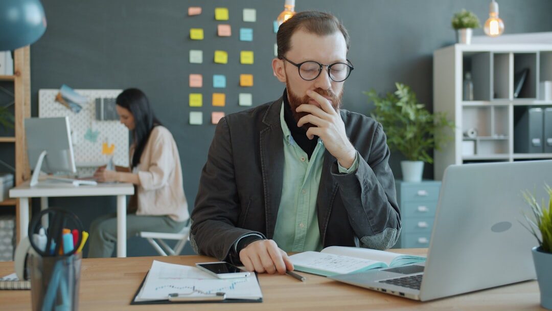 Business consultants reviewing growth strategy in a modern Brussels office
