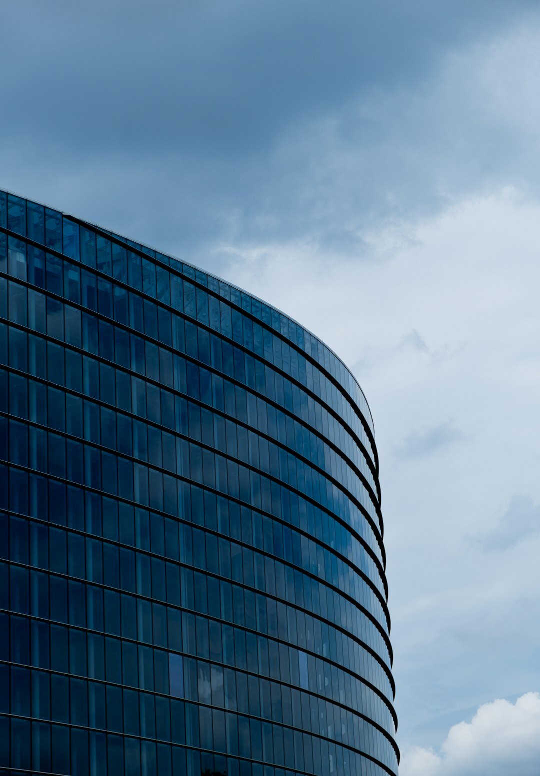 Modern glass office building exterior in a European city