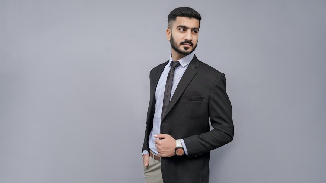 Studio portrait of a Belgian businessman consultant in a suit
