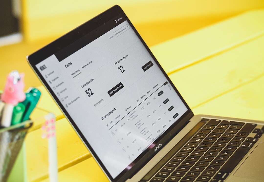 Laptop screen showing business growth analytics dashboard